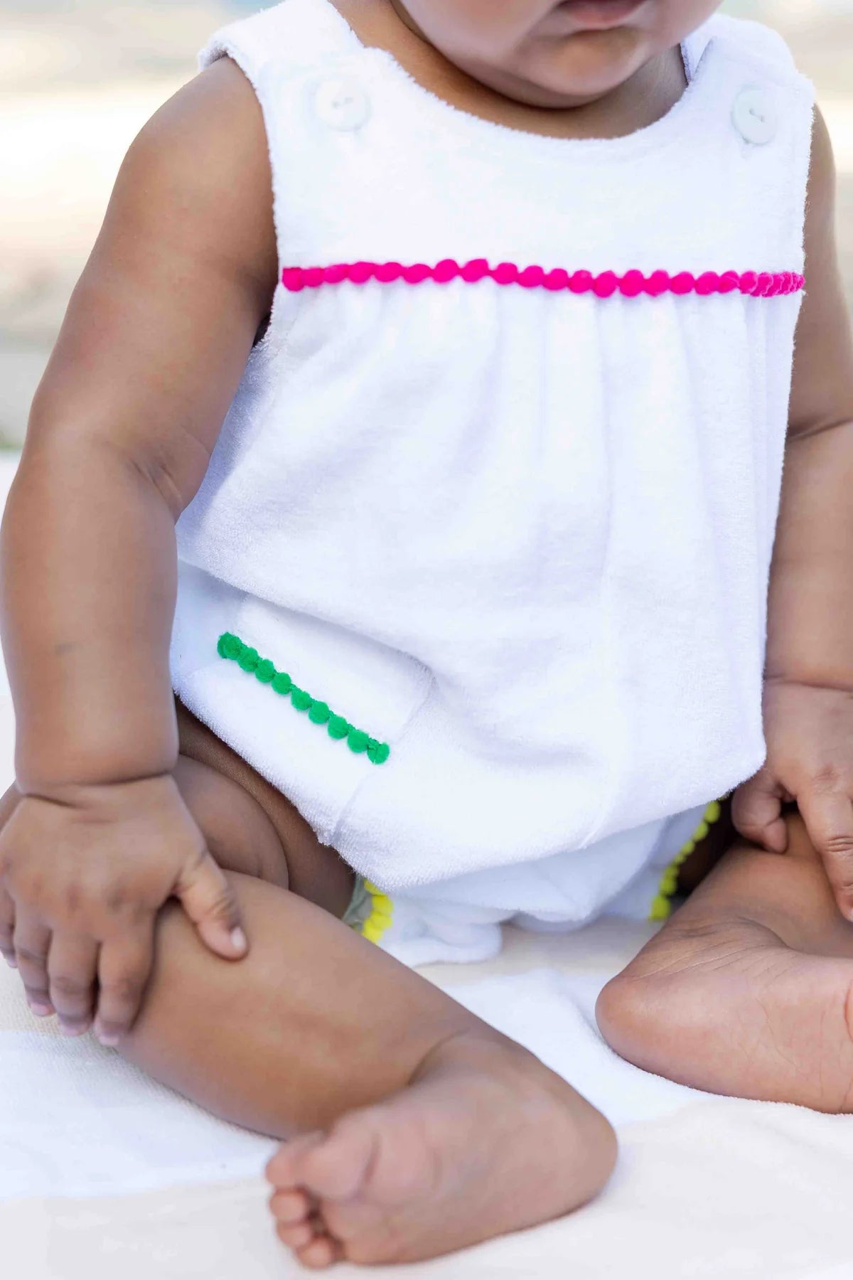 Terry Romper With Pom Poms