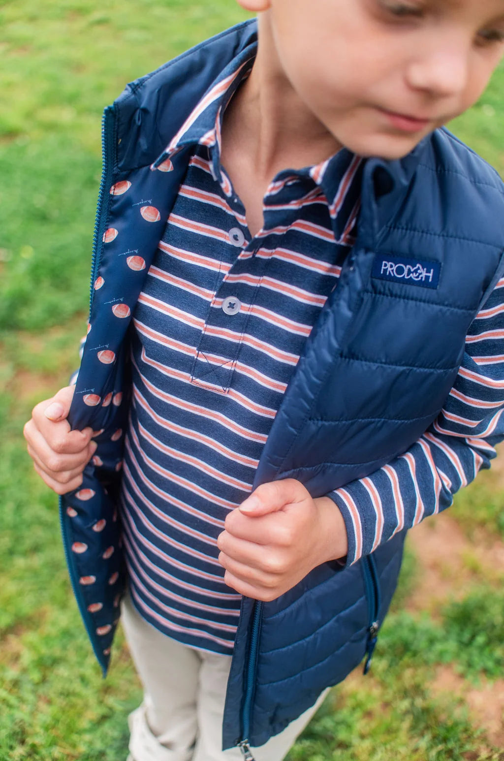 Boys Puffer Vest in Dark Denim Blue with Football Print Liner